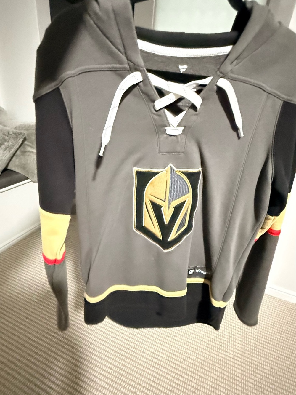 Vegas Golden Knights jersey hoodie, with large logo patches.